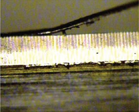 Slivers of metal online on the surface of an anilox role